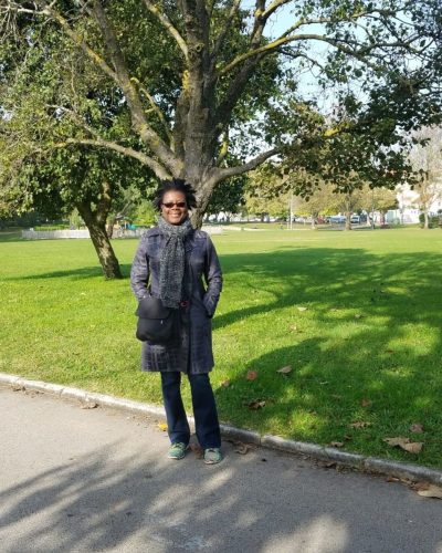 Standing in Jardim da Torre de Belem in Lisbon, Portugal